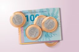 moedas de um real e notas de dinheiro representando o empréstimo sem garantia