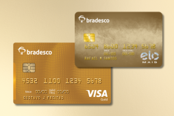 cartões bradesco gold em um fundo dourado