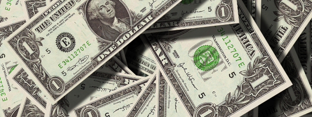 várias notas de dólar simbolizando a cotação do dólar