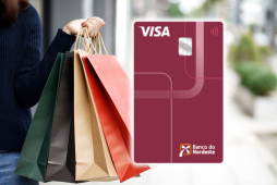 cartão bnb visa internacional com uma mulher segurando sacolas de compras ao fundo