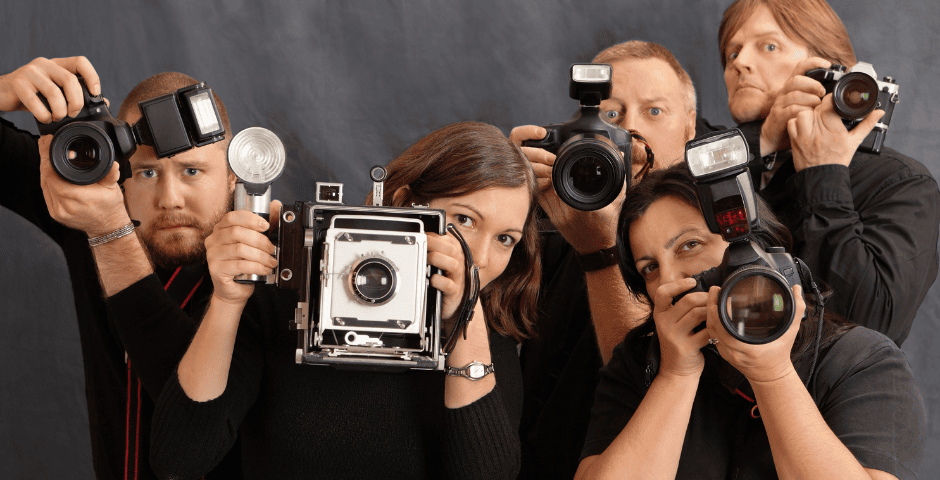 fotógrafos representando quanto ganha um fotógrafo